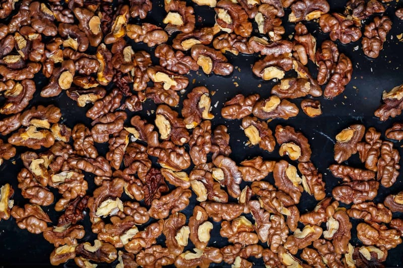 Close-up of walnut nuts, healthy snack or recipe ingredient, top view.