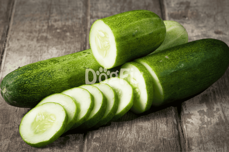 Fresh cucumbers sliced and whole, ideal for healthy snacks and salads.