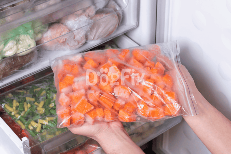 High-quality frozen dog food with nutritious vegetables stored in a freezer.