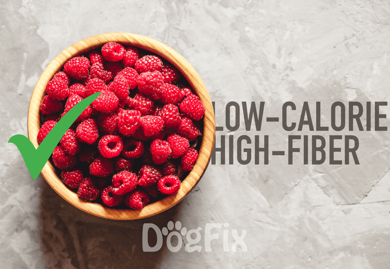 Fresh raspberries in a wooden bowl, highlighting their healthy, low-calorie, high-fiber benefits.