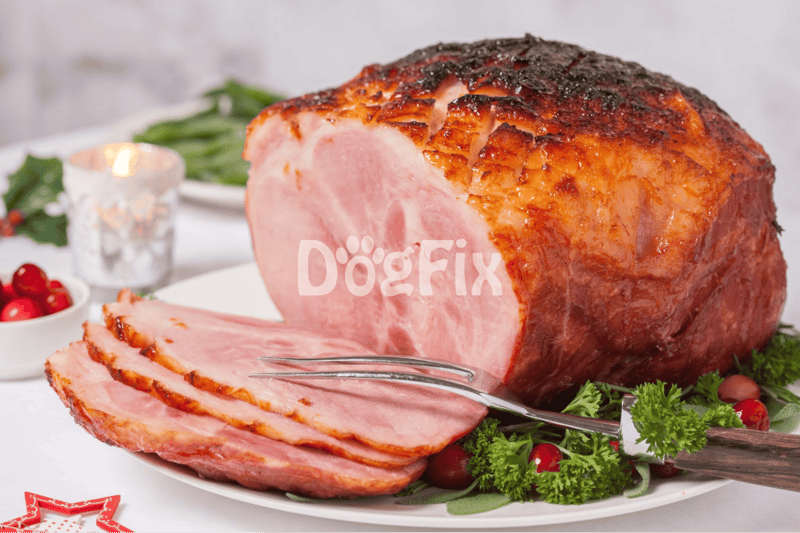 Delicious holiday ham slices on a festive white plate, perfect for dog-friendly holiday treats.