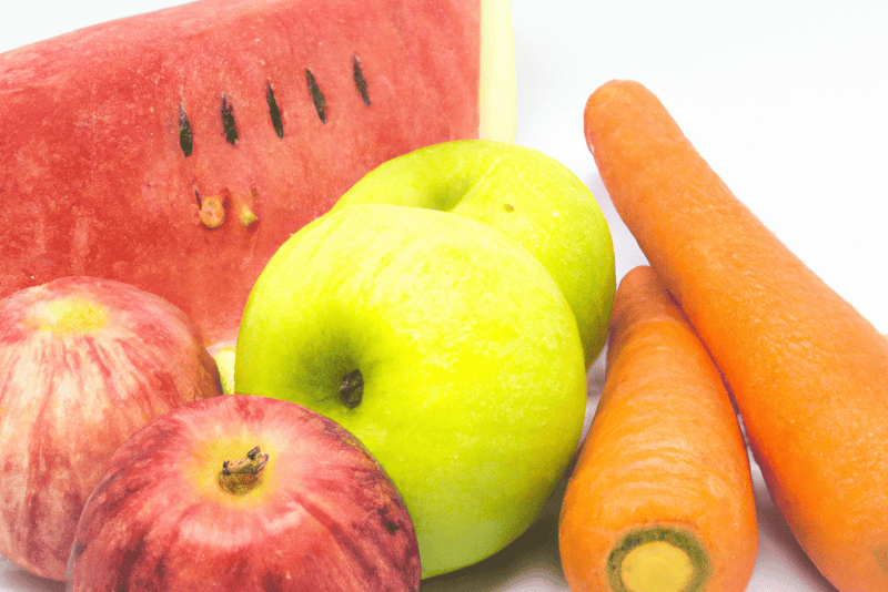 Healthy fruits for dog diet including apples, carrots, and watermelon ingredients.
