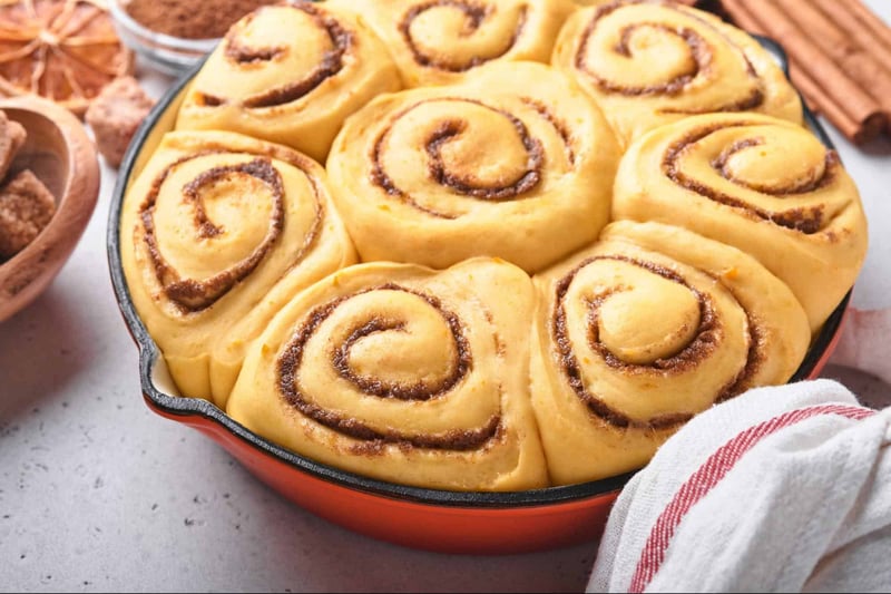 Delicious homemade cinnamon rolls with swirls of cinnamon and sugar, perfect for breakfast and dessert.