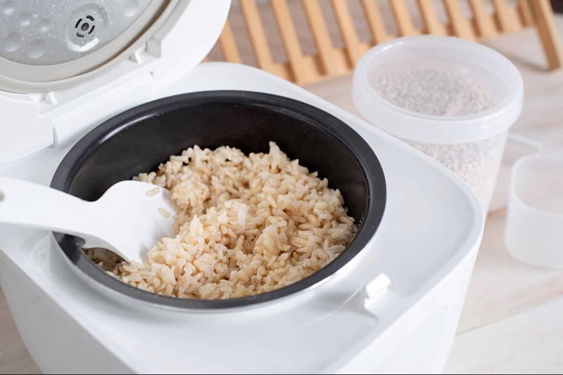 High-quality rice cooked in a pet-friendly rice cooker for healthy dog food.