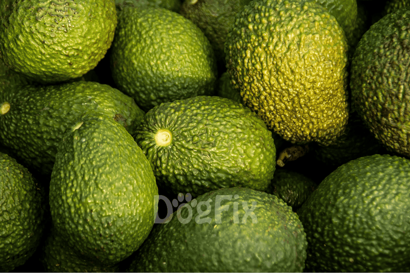 Bright green, textured limes stacked together.