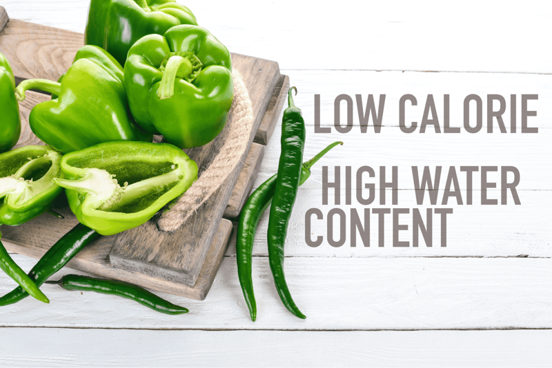 Fresh green peppers and chilies, low-calorie, high water content, ideal for nutritious dog snacks.