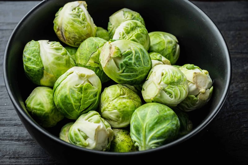 Vibrant green Brussels sprouts, known for health benefits for dogs and enriching their diet.