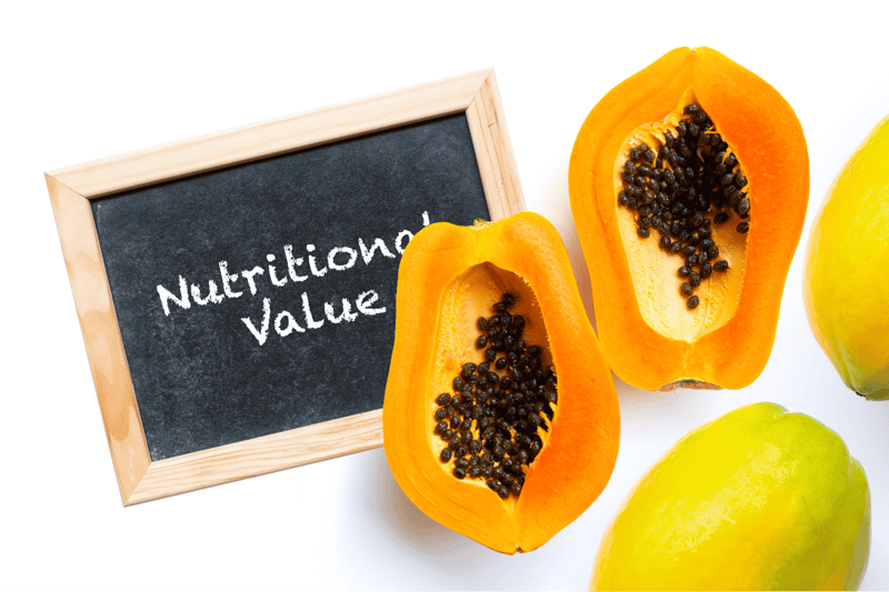 Vivid papaya image showing ripe fruit's orange flesh and black seeds, emphasizing health benefits.
