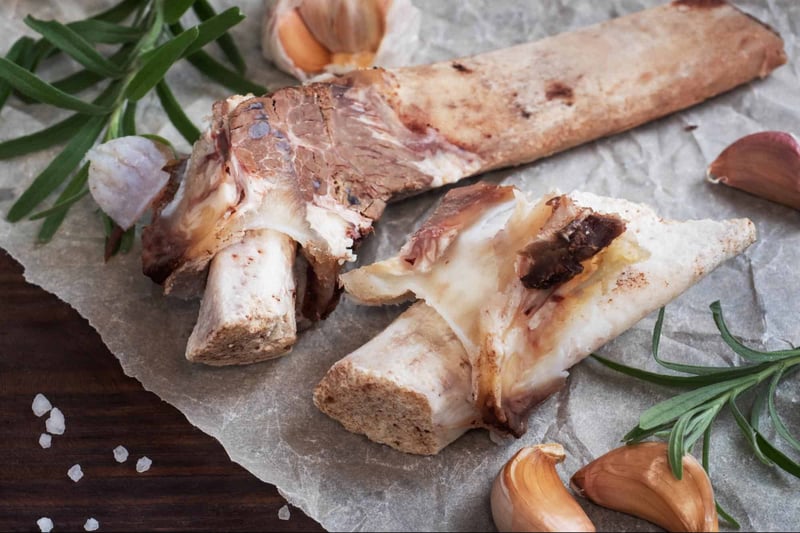 Dog bones and jerky treats made with natural ingredients for dogs' healthy snacks.