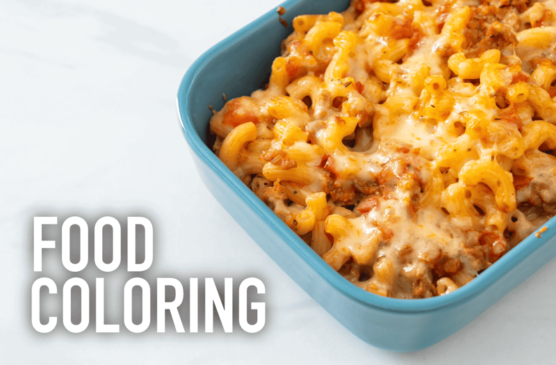 Cheesy baked pasta in a blue dish, a tasty comfort food perfect for family dinners.
