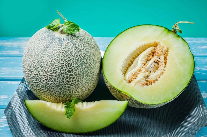 Fresh melon and cantaloupe with slices, vibrant colors, ideal for healthy snacking.