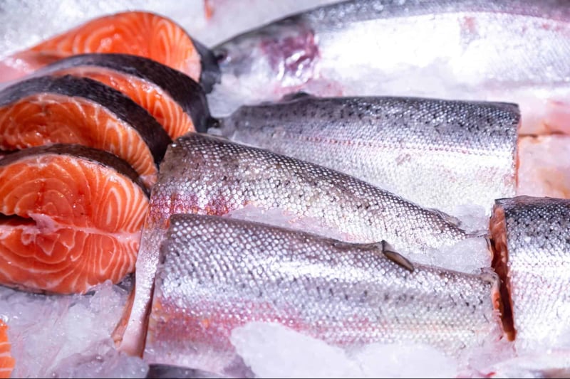High-quality salmon fillets on ice, ready for fresh seafood delivery or cooking.