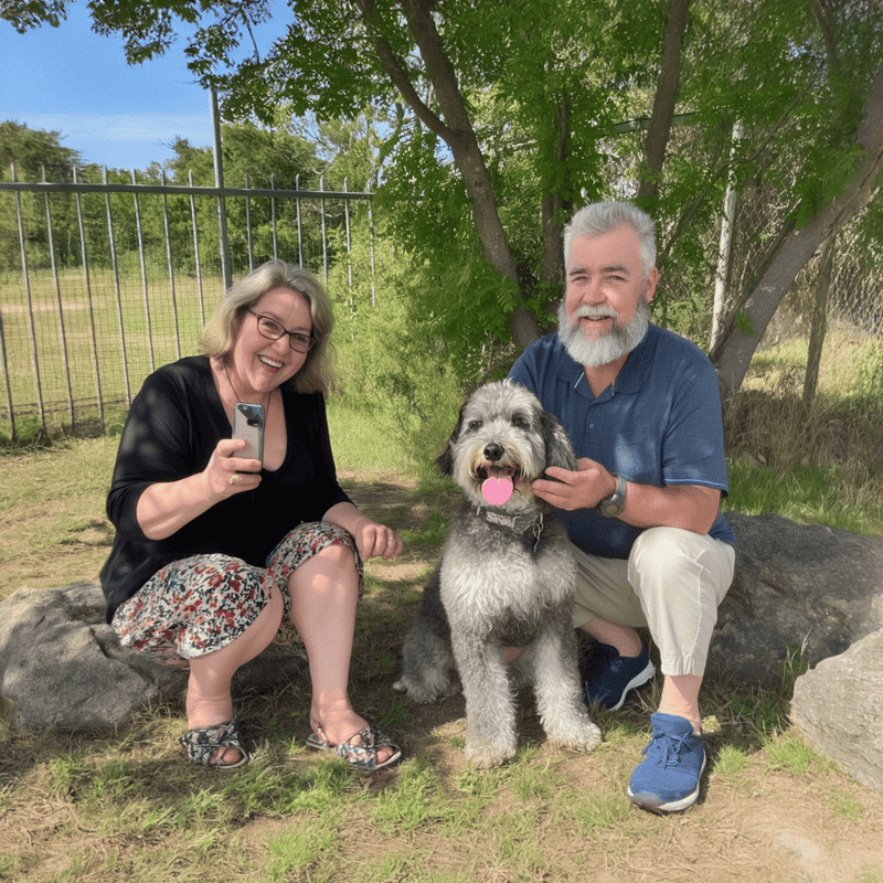 Smiling woman, man, and dog outdoors, showcasing happy pet health and bonding with Dogfix.