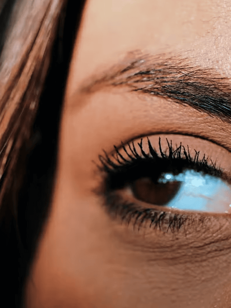 Close-up of a woman’s eye highlighting perfect vision and eye health.