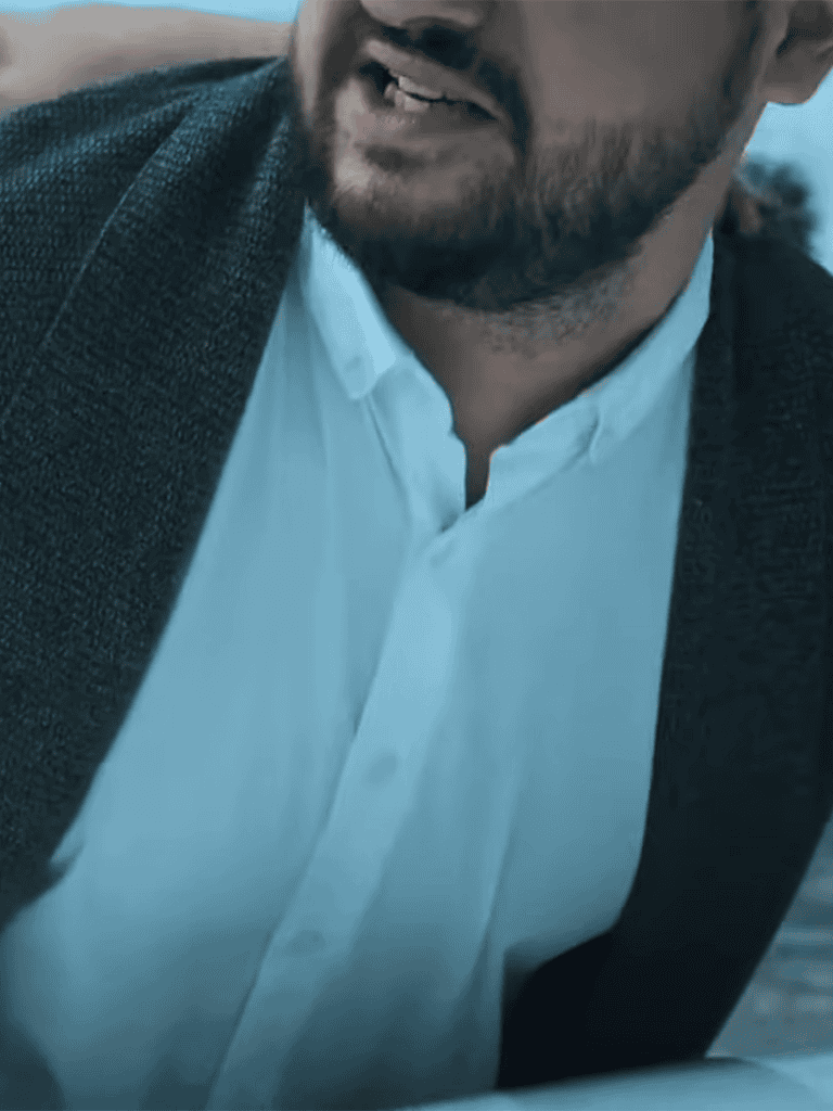 Clean, well-edited image of a man in business attire outdoors.